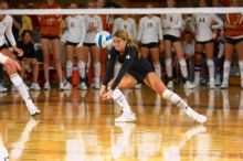 UT senior Alyson Jennings (#16, L) hits the ball.  The Longhorns defeated the Huskers 3-0 on Wednesday night, October 24, 2007 at Gregory Gym.

Filename: SRM_20071024_1931508.jpg
Aperture: f/4.0
Shutter Speed: 1/400
Body: Canon EOS-1D Mark II
Lens: Canon EF 80-200mm f/2.8 L