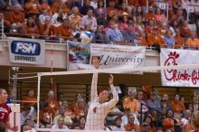 UT senior Michelle Moriarty (#4, S).  The Longhorns defeated the Huskers 3-0 on Wednesday night, October 24, 2007 at Gregory Gym.

Filename: SRM_20071024_1932429.jpg
Aperture: f/4.0
Shutter Speed: 1/400
Body: Canon EOS-1D Mark II
Lens: Canon EF 80-200mm f/2.8 L