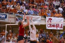 UT senior Michelle Moriarty (#4, S) blocks a hit by Nebraska senior Christina Houghtelling (#3, OH).  The Longhorns defeated the Huskers 3-0 on Wednesday night, October 24, 2007 at Gregory Gym.

Filename: SRM_20071024_1932440.jpg
Aperture: f/4.0
Shutter Speed: 1/400
Body: Canon EOS-1D Mark II
Lens: Canon EF 80-200mm f/2.8 L