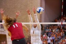 UT junior Lauren Paolini (#3, UTIL) and UT freshman Juliann Faucette (#1, OH) miss a block on Nebraska senior Tracy Stalls (#11, MB).  The Longhorns defeated the Huskers 3-0 on Wednesday night, October 24, 2007 at Gregory Gym.

Filename: SRM_20071024_1933263.jpg
Aperture: f/4.0
Shutter Speed: 1/320
Body: Canon EOS-1D Mark II
Lens: Canon EF 80-200mm f/2.8 L