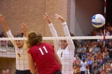 UT junior Lauren Paolini (#3, UTIL) and UT freshman Juliann Faucette (#1, OH) miss a block on Nebraska senior Tracy Stalls (#11, MB).  The Longhorns defeated the Huskers 3-0 on Wednesday night, October 24, 2007 at Gregory Gym.

Filename: SRM_20071024_1933284.jpg
Aperture: f/4.0
Shutter Speed: 1/320
Body: Canon EOS-1D Mark II
Lens: Canon EF 80-200mm f/2.8 L