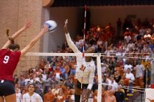 UT sophomore Destinee Hooker (#21, OH) hits the ball past Nebraska senior Sarah Pavan (#9, RS) as UT freshman Juliann Faucette (#1, OH) watches.  The Longhorns defeated the Huskers 3-0 on Wednesday night, October 24, 2007 at Gregory Gym.

Filename: SRM_20071024_1937427.jpg
Aperture: f/4.0
Shutter Speed: 1/320
Body: Canon EOS-1D Mark II
Lens: Canon EF 80-200mm f/2.8 L