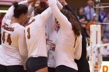 UT senior Brandy Magee (#44, MB), UT junior Lauren Paolini (#3, UTIL), UT sophomore Ashley Engle (#10, S/RS), UT freshman Juliann Faucette (#1, OH) and UT senior Alyson Jennings (#16, L) prepare for the third game.  The Longhorns defeated the Huskers 3-0 o

Filename: SRM_20071024_1948266.jpg
Aperture: f/4.0
Shutter Speed: 1/320
Body: Canon EOS-1D Mark II
Lens: Canon EF 80-200mm f/2.8 L