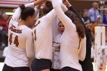 UT senior Brandy Magee (#44, MB), UT junior Lauren Paolini (#3, UTIL), UT sophomore Ashley Engle (#10, S/RS), UT freshman Juliann Faucette (#1, OH) and UT senior Alyson Jennings (#16, L) prepare for the third game.  The Longhorns defeated the Huskers 3-0 o

Filename: SRM_20071024_1948267.jpg
Aperture: f/4.0
Shutter Speed: 1/320
Body: Canon EOS-1D Mark II
Lens: Canon EF 80-200mm f/2.8 L