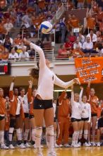 UT senior Michelle Moriarty (#4, S) serves the ball.  The Longhorns defeated the Huskers 3-0 on Wednesday night, October 24, 2007 at Gregory Gym.

Filename: SRM_20071024_1949009.jpg
Aperture: f/4.0
Shutter Speed: 1/320
Body: Canon EOS-1D Mark II
Lens: Canon EF 80-200mm f/2.8 L