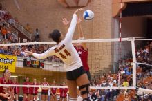 UT senior Brandy Magee (#44, MB) spikes past Nebraska junior Jordan Larson (#10, OH) as Nebraska sophomore Kori Cooper (#15, MB) watches.  The Longhorns defeated the Huskers 3-0 on Wednesday night, October 24, 2007 at Gregory Gym.

Filename: SRM_20071024_1951166.jpg
Aperture: f/4.0
Shutter Speed: 1/320
Body: Canon EOS-1D Mark II
Lens: Canon EF 80-200mm f/2.8 L