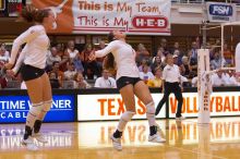 UT junior Kiley Hall (#11, DS/L) and UT freshman Juliann Faucette (#1, OH) are ecstatic after a point.  The Longhorns defeated the Huskers 3-0 on Wednesday night, October 24, 2007 at Gregory Gym.

Filename: SRM_20071024_1954488.jpg
Aperture: f/4.0
Shutter Speed: 1/400
Body: Canon EOS-1D Mark II
Lens: Canon EF 80-200mm f/2.8 L