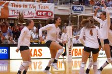 UT junior Kiley Hall (#11, DS/L), UT freshman Juliann Faucette (#1, OH), UT senior Michelle Moriarty (#4, S) and UT junior Lauren Paolini (#3, UTIL) are ecstatic after a point.  The Longhorns defeated the Huskers 3-0 on Wednesday night, October 24, 2007 at

Filename: SRM_20071024_1954521.jpg
Aperture: f/4.0
Shutter Speed: 1/400
Body: Canon EOS-1D Mark II
Lens: Canon EF 80-200mm f/2.8 L