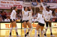 UT junior Kiley Hall (#11, DS/L), UT freshman Juliann Faucette (#1, OH), UT senior Michelle Moriarty (#4, S), UT junior Lauren Paolini (#3, UTIL) and UT sophomore Destinee Hooker (#21, OH) are ecstatic after a point.  The Longhorns defeated the Huskers 3-0

Filename: SRM_20071024_1954543.jpg
Aperture: f/4.0
Shutter Speed: 1/400
Body: Canon EOS-1D Mark II
Lens: Canon EF 80-200mm f/2.8 L