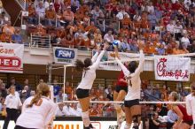 UT freshman Juliann Faucette (#1, OH) and UT senior Brandy Magee (#44, MB) attempt to block a hit by Nebraska senior Tracy Stalls (#11, MB) as UT sophomore Ashley Engle (#10, S/RS) and UT senior Michelle Moriarty (#4, S) watch.  The Longhorns defeated the

Filename: SRM_20071024_2002525.jpg
Aperture: f/4.0
Shutter Speed: 1/320
Body: Canon EOS-1D Mark II
Lens: Canon EF 80-200mm f/2.8 L