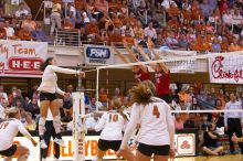 UT freshman Juliann Faucette (#1, OH) hits the ball past blockers Nebraska senior Sarah Pavan (#9, RS) and Nebraska sophomore Kori Cooper (#15, MB) as UT sophomore Heather Kisner (#19, DS), UT sophomore Ashley Engle (#10, S/RS) and UT senior Michelle Moria

Filename: SRM_20071024_2004220.jpg
Aperture: f/4.0
Shutter Speed: 1/320
Body: Canon EOS-1D Mark II
Lens: Canon EF 80-200mm f/2.8 L