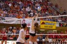 UT senior Michelle Moriarty (#4, S) sets the ball for UT senior Brandy Magee (#44, MB).  The Longhorns defeated the Huskers 3-0 on Wednesday night, October 24, 2007 at Gregory Gym.

Filename: SRM_20071024_2011262.jpg
Aperture: f/4.0
Shutter Speed: 1/400
Body: Canon EOS-1D Mark II
Lens: Canon EF 80-200mm f/2.8 L