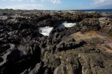 Hike to the Nakalele blowholes along the surf-beaten lava formations.

Filename: SRM_20071219_1229337.jpg
Aperture: f/8.0
Shutter Speed: 1/2500
Body: Canon EOS-1D Mark II
Lens: Sigma 15-30mm f/3.5-4.5 EX Aspherical DG DF