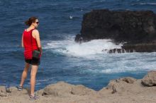 Carolyn Bayer.  Hike to the Nakalele blowholes along the surf-beaten lava formations.

Filename: SRM_20071219_1333377.jpg
Aperture: f/8.0
Shutter Speed: 1/1250
Body: Canon EOS 20D
Lens: Canon EF 80-200mm f/2.8 L