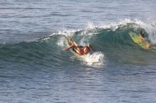 Surfers in Honolua Bay, Maui, Hawai'i, 2007.

Filename: SRM_20071217_1623364.jpg
Aperture: f/5.6
Shutter Speed: 1/1000
Body: Canon EOS 20D
Lens: Canon EF 300mm f/2.8 L IS
