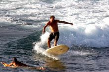 Surfers in Honolua Bay, Maui, Hawai'i, 2007.

Filename: SRM_20071217_1628250.jpg
Aperture: f/8.0
Shutter Speed: 1/1000
Body: Canon EOS 20D
Lens: Canon EF 300mm f/2.8 L IS
