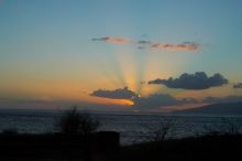 Sunset over the island of Lanai in Lahaina, Maui, Hawai'i, 2007.

Filename: SRM_20071219_1746280.jpg
Aperture: f/8.0
Shutter Speed: 1/320
Body: Canon EOS-1D Mark II
Lens: Canon EF 50mm f/1.8 II