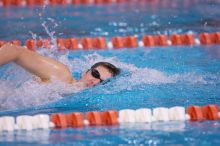 UT junior Michael Klueh won the 1000 yard freestyle with a time of 9:01.89.  The University of Texas Longhorns defeated The University of Georgia Bulldogs 157-135 on Saturday, January 12, 2008.

Filename: SRM_20080112_1107589.jpg
Aperture: f/2.8
Shutter Speed: 1/400
Body: Canon EOS-1D Mark II
Lens: Canon EF 300mm f/2.8 L IS