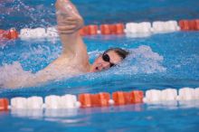 UT junior Michael Klueh won the 1000 yard freestyle with a time of 9:01.89.  The University of Texas Longhorns defeated The University of Georgia Bulldogs 157-135 on Saturday, January 12, 2008.

Filename: SRM_20080112_1108263.jpg
Aperture: f/2.8
Shutter Speed: 1/400
Body: Canon EOS-1D Mark II
Lens: Canon EF 300mm f/2.8 L IS