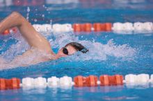 UT junior Michael Klueh won the 1000 yard freestyle with a time of 9:01.89.  The University of Texas Longhorns defeated The University of Georgia Bulldogs 157-135 on Saturday, January 12, 2008.

Filename: SRM_20080112_1108503.jpg
Aperture: f/2.8
Shutter Speed: 1/400
Body: Canon EOS-1D Mark II
Lens: Canon EF 300mm f/2.8 L IS