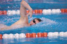 UT junior Michael Klueh won the 1000 yard freestyle with a time of 9:01.89.  The University of Texas Longhorns defeated The University of Georgia Bulldogs 157-135 on Saturday, January 12, 2008.

Filename: SRM_20080112_1108524.jpg
Aperture: f/2.8
Shutter Speed: 1/400
Body: Canon EOS-1D Mark II
Lens: Canon EF 300mm f/2.8 L IS