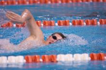 UT junior Michael Klueh won the 1000 yard freestyle with a time of 9:01.89.  The University of Texas Longhorns defeated The University of Georgia Bulldogs 157-135 on Saturday, January 12, 2008.

Filename: SRM_20080112_1108546.jpg
Aperture: f/2.8
Shutter Speed: 1/400
Body: Canon EOS-1D Mark II
Lens: Canon EF 300mm f/2.8 L IS