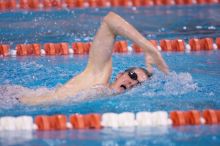 UT junior Michael Klueh won the 1000 yard freestyle with a time of 9:01.89.  The University of Texas Longhorns defeated The University of Georgia Bulldogs 157-135 on Saturday, January 12, 2008.

Filename: SRM_20080112_1108547.jpg
Aperture: f/2.8
Shutter Speed: 1/400
Body: Canon EOS-1D Mark II
Lens: Canon EF 300mm f/2.8 L IS