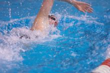 UT junior Michael Klueh won the 1000 yard freestyle with a time of 9:01.89.  The University of Texas Longhorns defeated The University of Georgia Bulldogs 157-135 on Saturday, January 12, 2008.

Filename: SRM_20080112_1110084.jpg
Aperture: f/2.8
Shutter Speed: 1/400
Body: Canon EOS-1D Mark II
Lens: Canon EF 300mm f/2.8 L IS