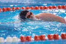 UT sophomore Trey Hoover took fifth in the 1000 yard freestyle with a time of 9:47.70.  The University of Texas Longhorns defeated The University of Georgia Bulldogs 157-135 on Saturday, January 12, 2008.

Filename: SRM_20080112_1111300.jpg
Aperture: f/2.8
Shutter Speed: 1/400
Body: Canon EOS-1D Mark II
Lens: Canon EF 300mm f/2.8 L IS