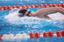 UT sophomore Trey Hoover took fifth in the 1000 yard freestyle with a time of 9:47.70.  The University of Texas Longhorns defeated The University of Georgia Bulldogs 157-135 on Saturday, January 12, 2008.

Filename: SRM_20080112_1111321.jpg
Aperture: f/2.8
Shutter Speed: 1/400
Body: Canon EOS-1D Mark II
Lens: Canon EF 300mm f/2.8 L IS