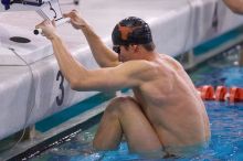 UT senior Daniel Rohleder took first in the 100 yard backstroke with a time of 9:11.44.  The University of Texas Longhorns defeated The University of Georgia Bulldogs 157-135 on Saturday, January 12, 2008.

Filename: SRM_20080112_1122248.jpg
Aperture: f/2.8
Shutter Speed: 1/400
Body: Canon EOS-1D Mark II
Lens: Canon EF 300mm f/2.8 L IS