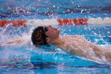 UT senior Daniel Rohleder took first in the 100 yard backstroke with a time of 9:11.44.  The University of Texas Longhorns defeated The University of Georgia Bulldogs 157-135 on Saturday, January 12, 2008.

Filename: SRM_20080112_1122468.jpg
Aperture: f/2.8
Shutter Speed: 1/400
Body: Canon EOS-1D Mark II
Lens: Canon EF 300mm f/2.8 L IS