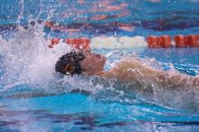 UT senior Daniel Rohleder took first in the 100 yard backstroke with a time of 9:11.44.  The University of Texas Longhorns defeated The University of Georgia Bulldogs 157-135 on Saturday, January 12, 2008.

Filename: SRM_20080112_1122489.jpg
Aperture: f/2.8
Shutter Speed: 1/400
Body: Canon EOS-1D Mark II
Lens: Canon EF 300mm f/2.8 L IS