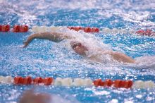 Georgia's Chris Spooner took fifth in the 100 yard backstroke with a time of 52.45.  The University of Texas Longhorns defeated The University of Georgia Bulldogs 157-135 on Saturday, January 12, 2008.

Filename: SRM_20080112_1123304.jpg
Aperture: f/2.8
Shutter Speed: 1/400
Body: Canon EOS-1D Mark II
Lens: Canon EF 300mm f/2.8 L IS