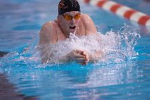 UT senior Agustin Magruder took second in the 100 yard breaststroke with a time of 56.67.  The University of Texas Longhorns defeated The University of Georgia Bulldogs 157-135 on Saturday, January 12, 2008.

Filename: SRM_20080112_1124287.jpg
Aperture: f/2.8
Shutter Speed: 1/400
Body: Canon EOS-1D Mark II
Lens: Canon EF 300mm f/2.8 L IS