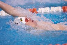 Georgia's Mark Dylla took third in the 200 yard backstroke with a time of 1:50.96.  The University of Texas Longhorns defeated The University of Georgia Bulldogs 157-135 on Saturday, January 12, 2008.

Filename: SRM_20080112_1159164.jpg
Aperture: f/2.8
Shutter Speed: 1/400
Body: Canon EOS-1D Mark II
Lens: Canon EF 300mm f/2.8 L IS