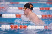 UT senior Matthew Lowe took first in the 200 yard breaststroke with a time of 2:01.46.  The University of Texas Longhorns defeated The University of Georgia Bulldogs 157-135 on Saturday, January 12, 2008.

Filename: SRM_20080112_1200325.jpg
Aperture: f/2.8
Shutter Speed: 1/400
Body: Canon EOS-1D Mark II
Lens: Canon EF 300mm f/2.8 L IS