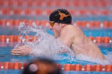 UT senior Matthew Lowe took first in the 200 yard breaststroke with a time of 2:01.46.  The University of Texas Longhorns defeated The University of Georgia Bulldogs 157-135 on Saturday, January 12, 2008.

Filename: SRM_20080112_1200504.jpg
Aperture: f/2.8
Shutter Speed: 1/400
Body: Canon EOS-1D Mark II
Lens: Canon EF 300mm f/2.8 L IS