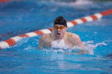 UT senior Matthew Lowe took first in the 200 yard breaststroke with a time of 2:01.46.  The University of Texas Longhorns defeated The University of Georgia Bulldogs 157-135 on Saturday, January 12, 2008.

Filename: SRM_20080112_1201545.jpg
Aperture: f/2.8
Shutter Speed: 1/400
Body: Canon EOS-1D Mark II
Lens: Canon EF 300mm f/2.8 L IS