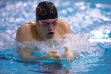 UT senior Matthew Lowe took first in the 200 yard breaststroke with a time of 2:01.46.  The University of Texas Longhorns defeated The University of Georgia Bulldogs 157-135 on Saturday, January 12, 2008.

Filename: SRM_20080112_1202064.jpg
Aperture: f/2.8
Shutter Speed: 1/400
Body: Canon EOS-1D Mark II
Lens: Canon EF 300mm f/2.8 L IS