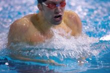 UT senior Matthew Lowe took first in the 200 yard breaststroke with a time of 2:01.46.  The University of Texas Longhorns defeated The University of Georgia Bulldogs 157-135 on Saturday, January 12, 2008.

Filename: SRM_20080112_1202107.jpg
Aperture: f/2.8
Shutter Speed: 1/400
Body: Canon EOS-1D Mark II
Lens: Canon EF 300mm f/2.8 L IS