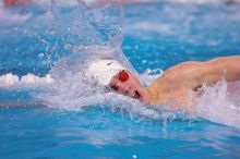 Georgia's Sebastien Rouault took second in the 500 yard freestyle with a time of 4:29.17.  The University of Texas Longhorns defeated The University of Georgia Bulldogs 157-135 on Saturday, January 12, 2008.

Filename: SRM_20080112_1205003.jpg
Aperture: f/2.8
Shutter Speed: 1/400
Body: Canon EOS-1D Mark II
Lens: Canon EF 300mm f/2.8 L IS