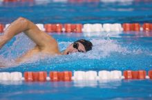 UT sophomore Ricky Berens took first  in the 500 yard freestyle with a time of 4:27.92.  The University of Texas Longhorns defeated The University of Georgia Bulldogs 157-135 on Saturday, January 12, 2008.

Filename: SRM_20080112_1208124.jpg
Aperture: f/2.8
Shutter Speed: 1/400
Body: Canon EOS-1D Mark II
Lens: Canon EF 300mm f/2.8 L IS