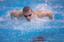 Georgia's Troyden Prinsloo took second in the 1000 yard freestyle with a time of 9:11.44.  The University of Texas Longhorns defeated The University of Georgia Bulldogs 157-135 on Saturday, January 12, 2008.

Filename: SRM_20080112_1210123.jpg
Aperture: f/2.8
Shutter Speed: 1/400
Body: Canon EOS-1D Mark II
Lens: Canon EF 300mm f/2.8 L IS