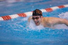 UT sophomore Trey Hoover competed in the 400 yard IM with a time of 4:10.06.  The University of Texas Longhorns defeated The University of Georgia Bulldogs 157-135 on Saturday, January 12, 2008.

Filename: SRM_20080112_1238046.jpg
Aperture: f/2.8
Shutter Speed: 1/400
Body: Canon EOS-1D Mark II
Lens: Canon EF 300mm f/2.8 L IS