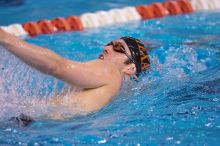 UT sophomore Trey Hoover competed in the 400 yard IM with a time of 4:10.06.  The University of Texas Longhorns defeated The University of Georgia Bulldogs 157-135 on Saturday, January 12, 2008.

Filename: SRM_20080112_1238565.jpg
Aperture: f/2.8
Shutter Speed: 1/400
Body: Canon EOS-1D Mark II
Lens: Canon EF 300mm f/2.8 L IS