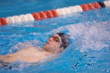 UT sophomore Trey Hoover competed in the 400 yard IM with a time of 4:10.06.  The University of Texas Longhorns defeated The University of Georgia Bulldogs 157-135 on Saturday, January 12, 2008.

Filename: SRM_20080112_1239049.jpg
Aperture: f/2.8
Shutter Speed: 1/400
Body: Canon EOS-1D Mark II
Lens: Canon EF 300mm f/2.8 L IS