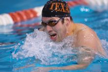 UT sophomore Trey Hoover competed in the 400 yard IM with a time of 4:10.06.  The University of Texas Longhorns defeated The University of Georgia Bulldogs 157-135 on Saturday, January 12, 2008.

Filename: SRM_20080112_1240088.jpg
Aperture: f/2.8
Shutter Speed: 1/400
Body: Canon EOS-1D Mark II
Lens: Canon EF 300mm f/2.8 L IS