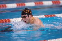 UT sophomore Trey Hoover competed in the 400 yard IM with a time of 4:10.06.  The University of Texas Longhorns defeated The University of Georgia Bulldogs 157-135 on Saturday, January 12, 2008.

Filename: SRM_20080112_1240266.jpg
Aperture: f/2.8
Shutter Speed: 1/400
Body: Canon EOS-1D Mark II
Lens: Canon EF 300mm f/2.8 L IS