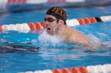 UT sophomore Trey Hoover competed in the 400 yard IM with a time of 4:10.06.  The University of Texas Longhorns defeated The University of Georgia Bulldogs 157-135 on Saturday, January 12, 2008.

Filename: SRM_20080112_1240328.jpg
Aperture: f/2.8
Shutter Speed: 1/400
Body: Canon EOS-1D Mark II
Lens: Canon EF 300mm f/2.8 L IS